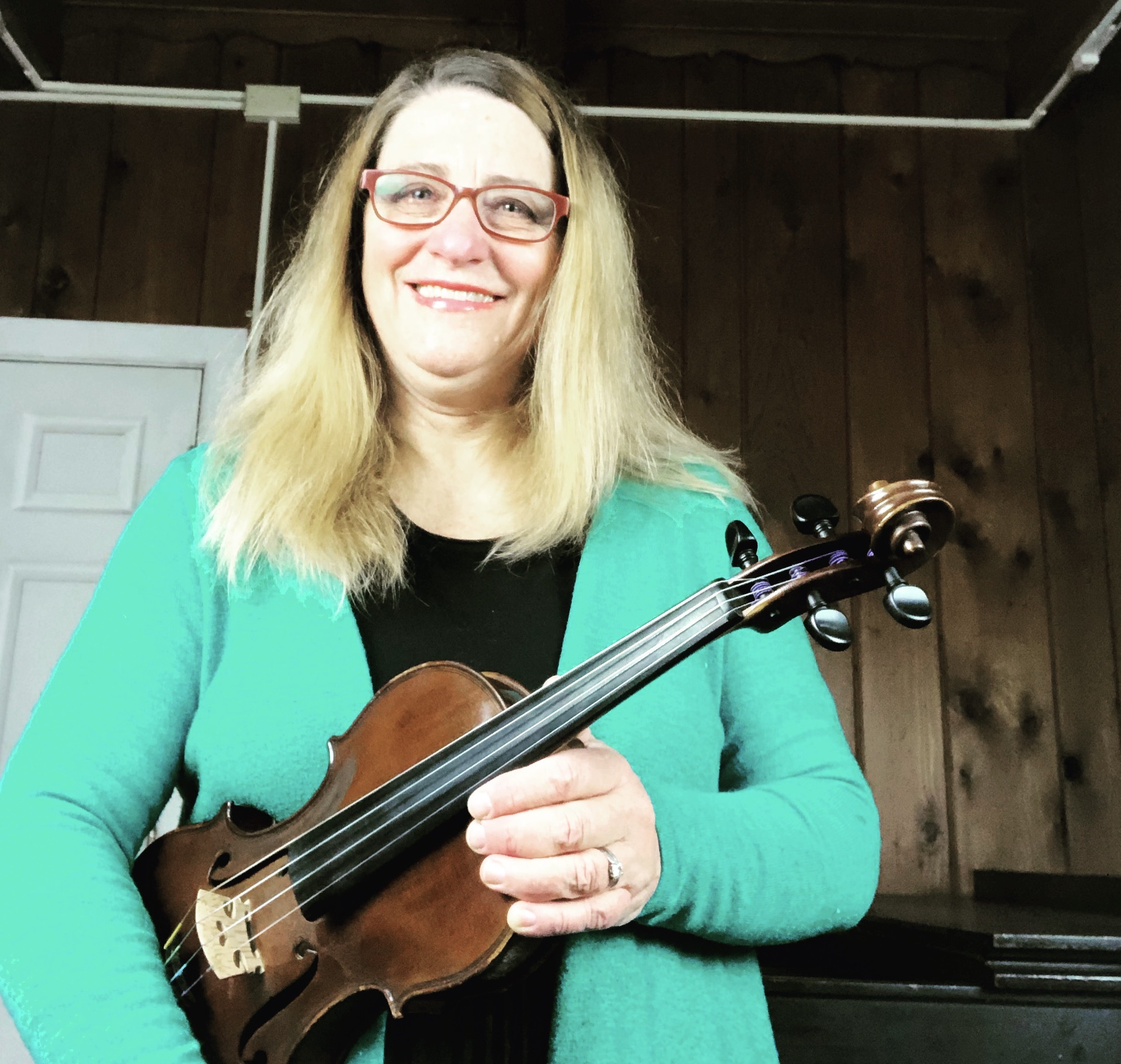 Jenny holding violin