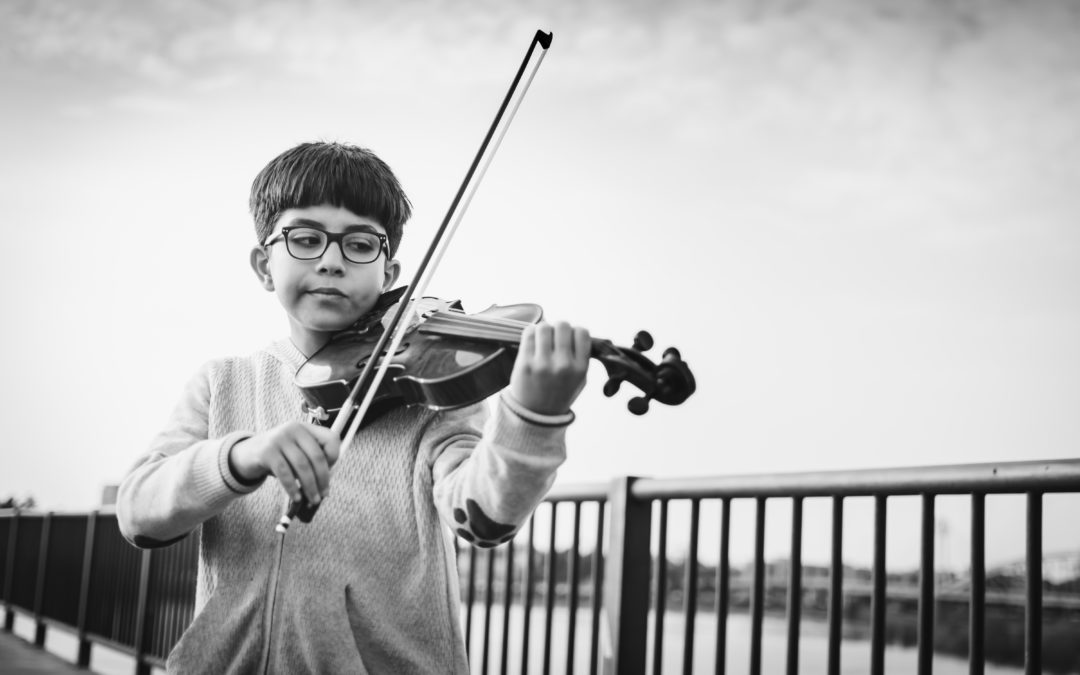 boy playing violin