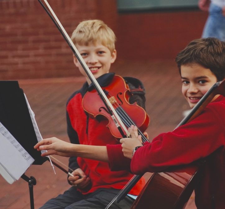 Boys playing Cello and Violin