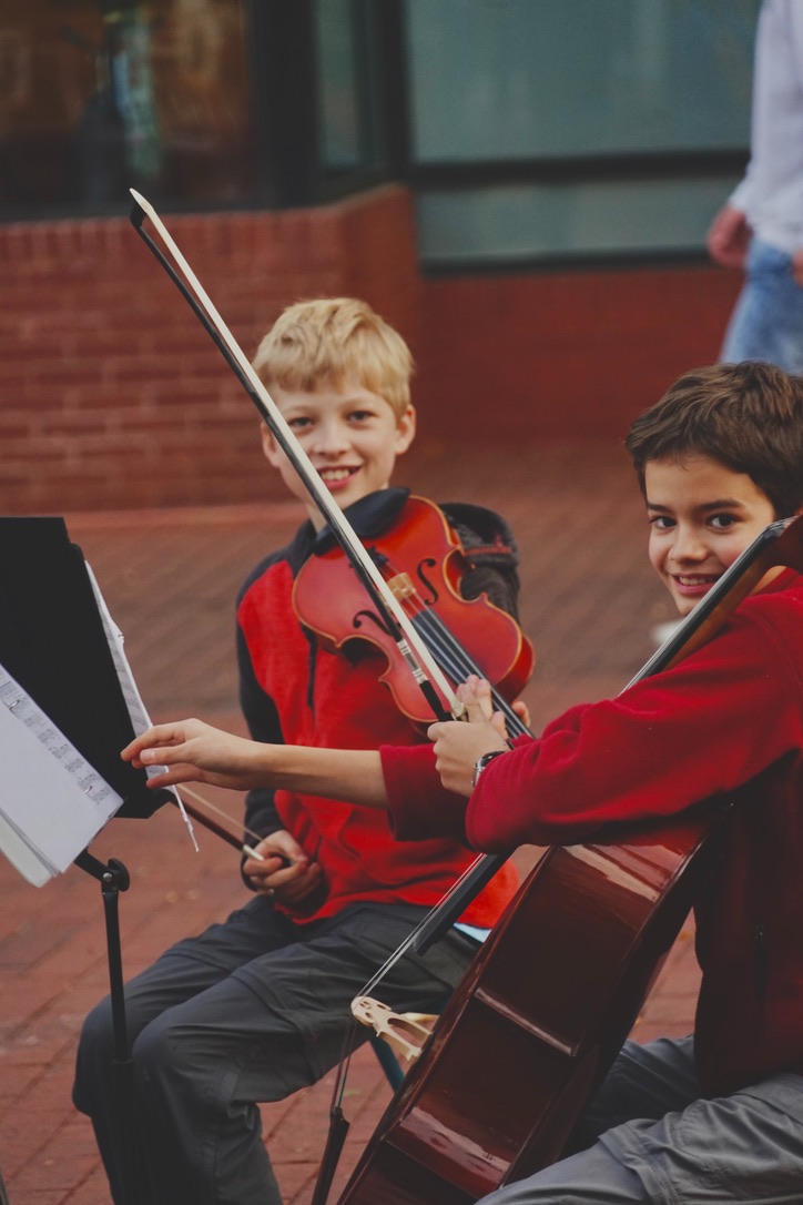 Boys playing Cello and Violin